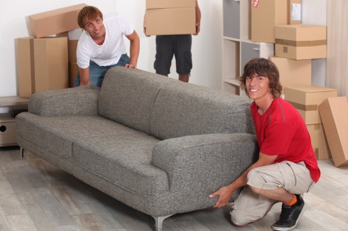 Local crew removing office furniture near Marylebone for a commercial customer