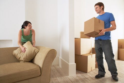 Moving team loading boxes and furniture in Marylebone